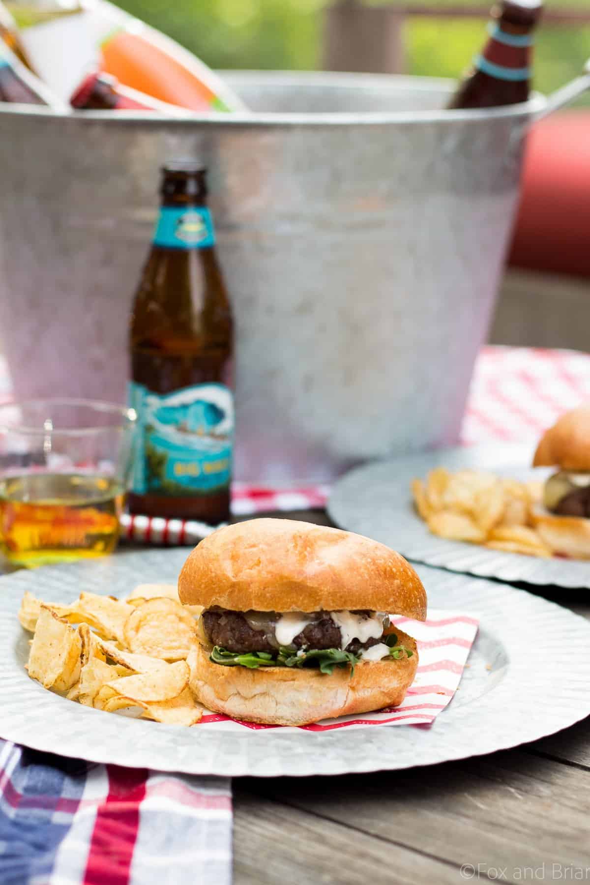 These Shallot White Cheddar Burgers use shallots to flavor the burger, and are topped with white cheddar and a garlic aioli for a flavor bomb gourmet burger!