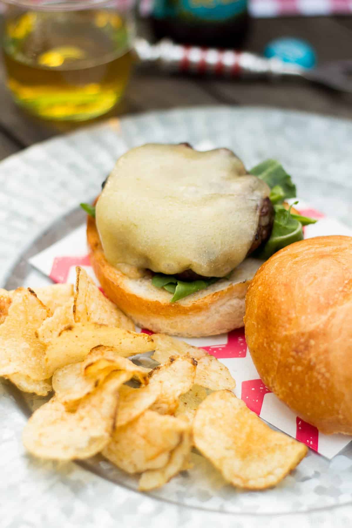 These Shallot White Cheddar Burgers use shallots to flavor the burger, and are topped with white cheddar and a garlic aioli for a flavor bomb gourmet burger!