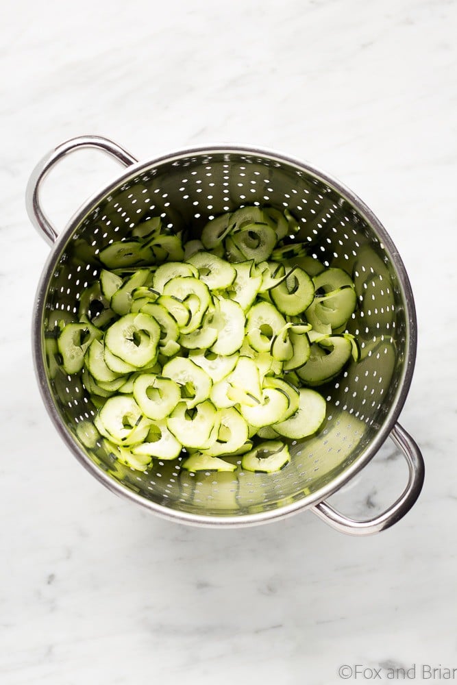 This Sesame Carrot and Cucumber Slaw is a cool and crisp side dish perfect for hot weather! It takes under 15 minutes to make, and is vegan and gluten free!