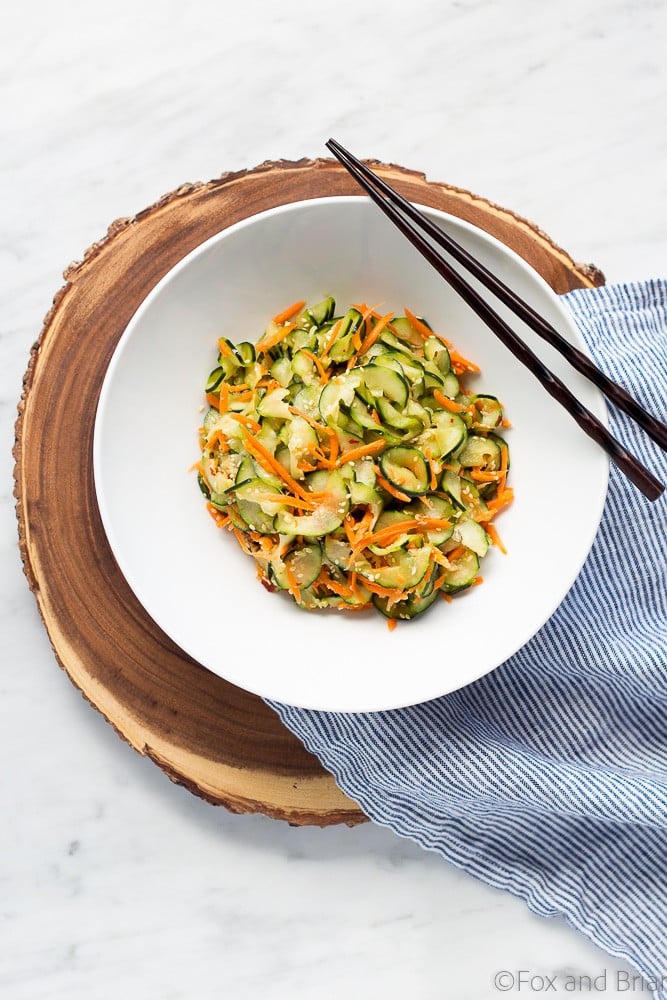 This Sesame Carrot and Cucumber Slaw is a cool and crisp side dish perfect for hot weather! It takes under 15 minutes to make, and is vegan and gluten free!