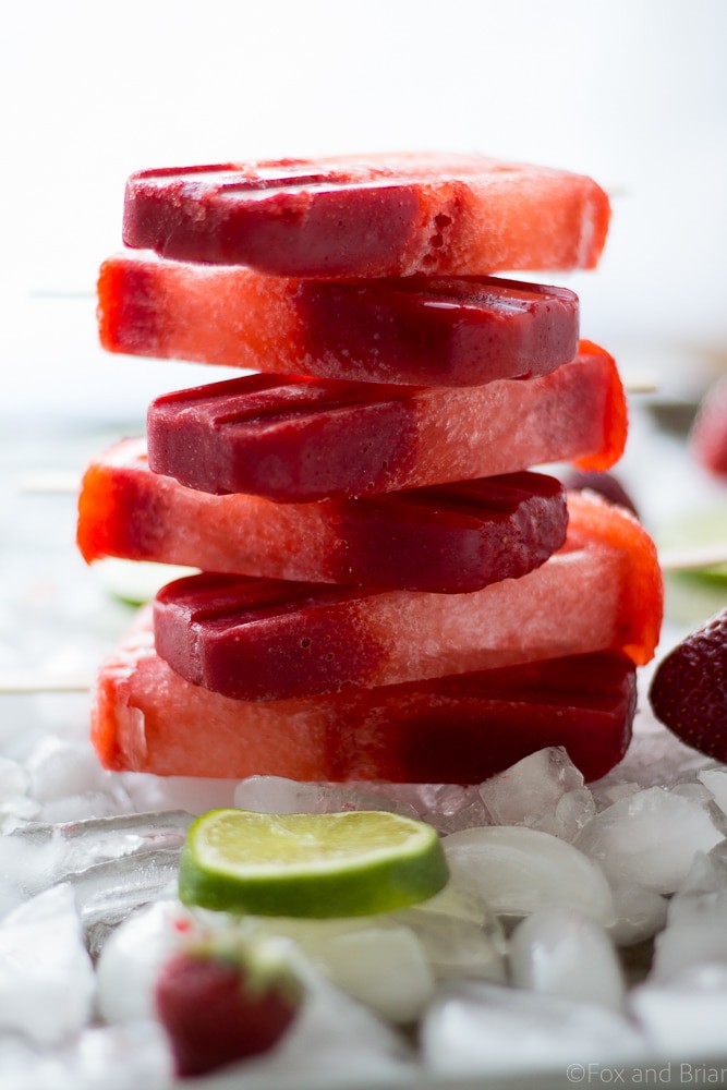 These Strawberry Lime Popsicles are easy to make and require only three ingredients! Whip up this simple recipe and have a cool treat on a hot day.