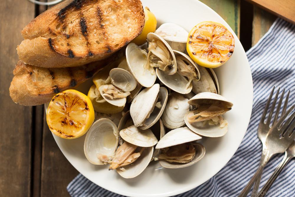 Learn how to make this simple recipe for Beer Steamed Clams - so easy you can even make them on the campfire! Includes instructions for cooking at home or on the campfire.