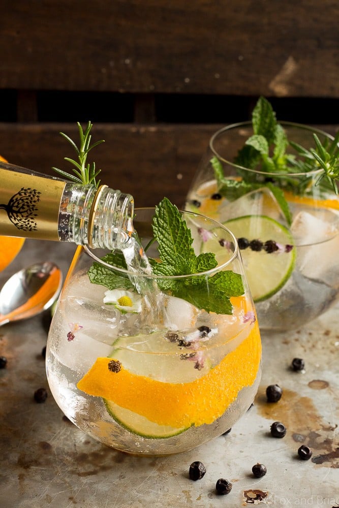 These Spanish Gin Tonics are the perfect refreshing sipper for a hot summer day! Ice cold, filled with aromatics, gin and high quality tonic, they are sure to cool you down!