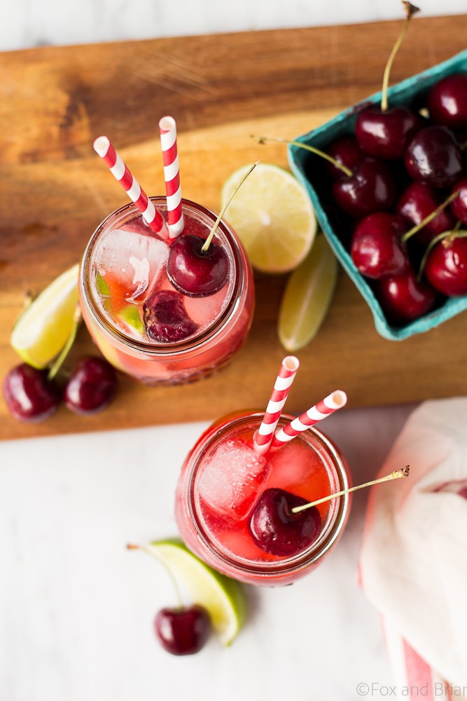 This Sparkling Cherry Limeade uses only four real ingredients - cherries, limes, water and sugar! Cherry Simple syrup mixes with lime juice and sparkling water to make a refreshing summer beverage that everyone can enjoy!