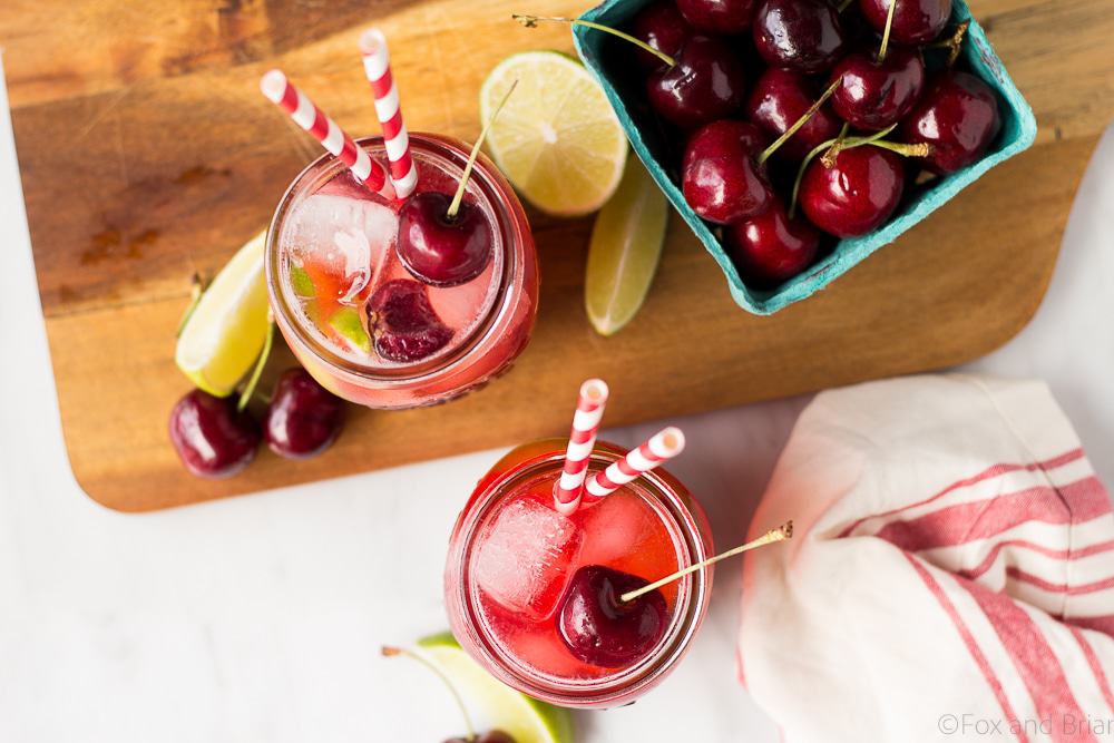 This Sparkling Cherry Limeade uses only four real ingredients - cherries, limes, water and sugar! Cherry Simple syrup mixes with lime juice and sparkling water to make a refreshing summer beverage that everyone can enjoy!