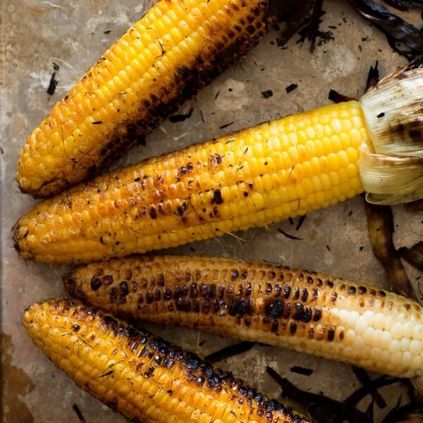 Nothing says summer like than fresh corn on the cob. Take advantage of its peak flavor by throwing it on the grill. This Charred Grilled Corn is packed full of smoky summer flavor, perfect for your next BBQ!