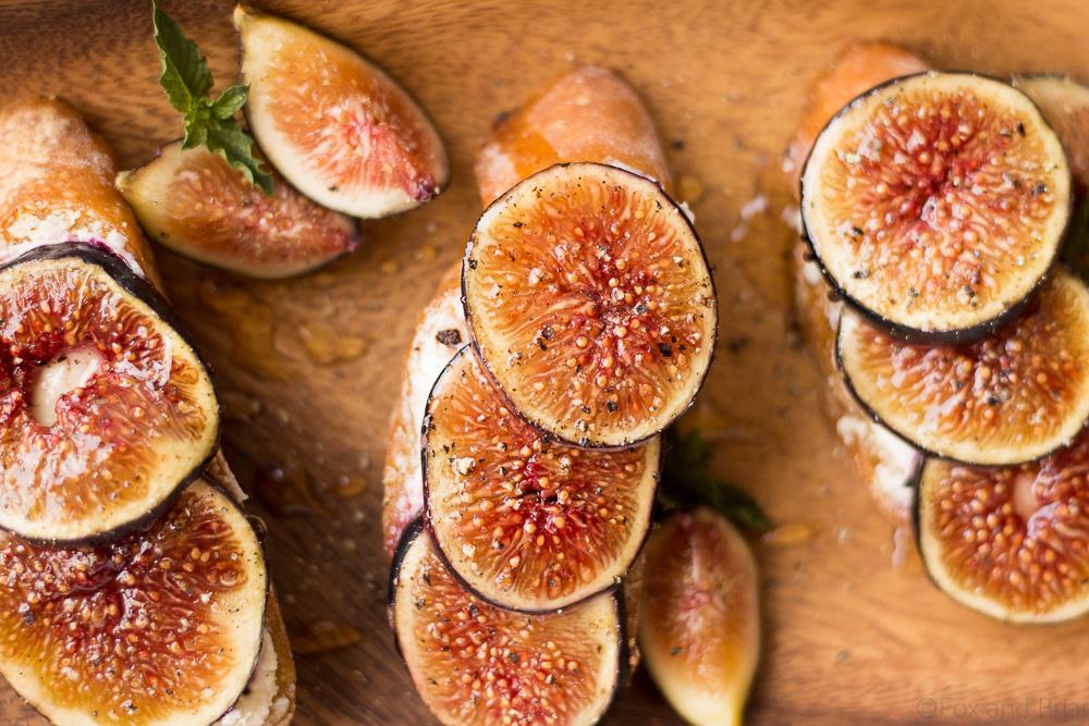 These Fig and Goat Cheese Crostini with Honey are one of my favorite simple summer appetizers. Using fresh figs, goat cheese, honey and pepper, these are an easy but elegant starter or snack.