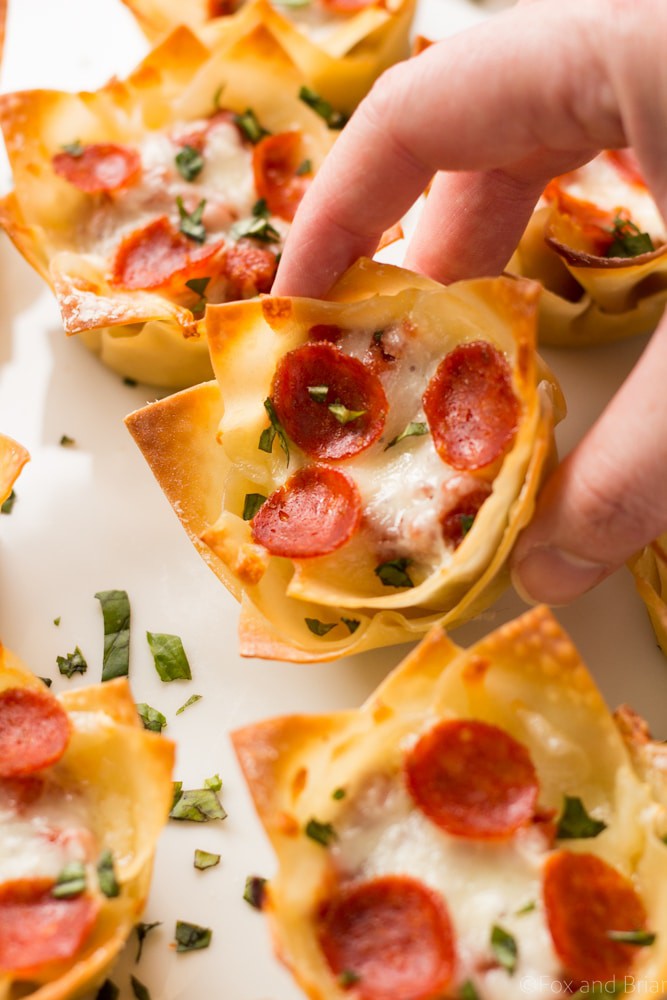 These cute Mini Pizza Dip Cups are cheesy and delicious! Perfect for your next party, game day or tailgate!