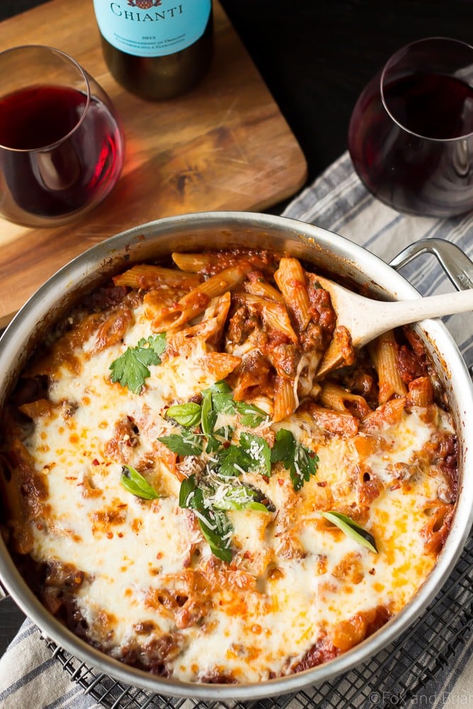 This easy One Pot Pasta Bake with Sausage and Wine only uses one pan - you don't even need to boil the noodles! It only takes about ten minutes to prep, then just bake it in the oven while you do something else! You won't believe how easy it is to make this delicious, cheesy pasta dinner! #sponsored #TasteofItaly