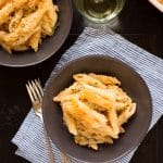 This decadent Four Cheese Truffle Mac and Cheese is creamy and delicious with a crispy topping! Four kinds of cheese, truffle oil and a panko topping make this the most delicious mac and cheese you have ever had!