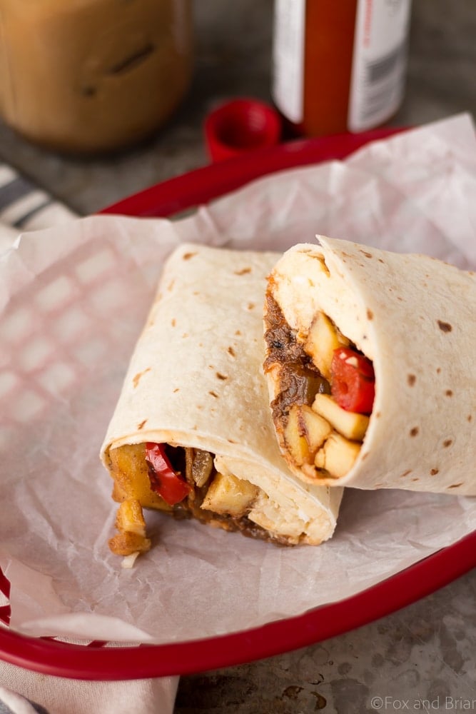 These Make Ahead Beef Breakfast Burritos are freezer friendly! Using tender, slow cooker shredded beef, breakfast potatoes, eggs and cheese, they can be made ahead of time and frozen. Just reheat them in the morning for a quick and hearty breakfast! #sponsored #WABeefLove