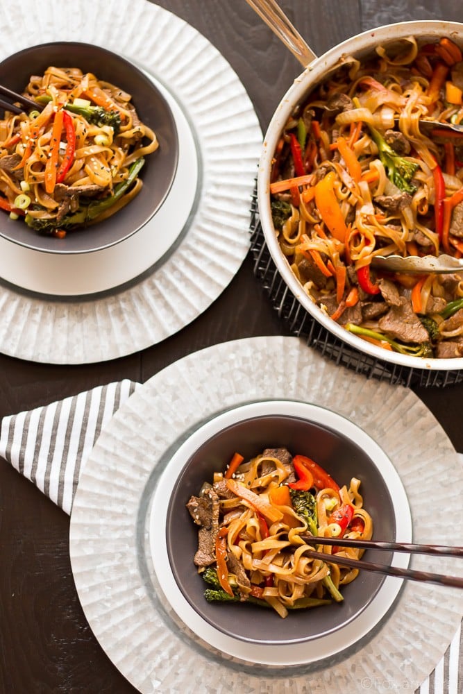 This quick and easy Beef Noodle Stir Fry takes under 30 minutes and is easily made gluten free! Full of veggies, beef and a flavorful sauce, your whole family will love it!