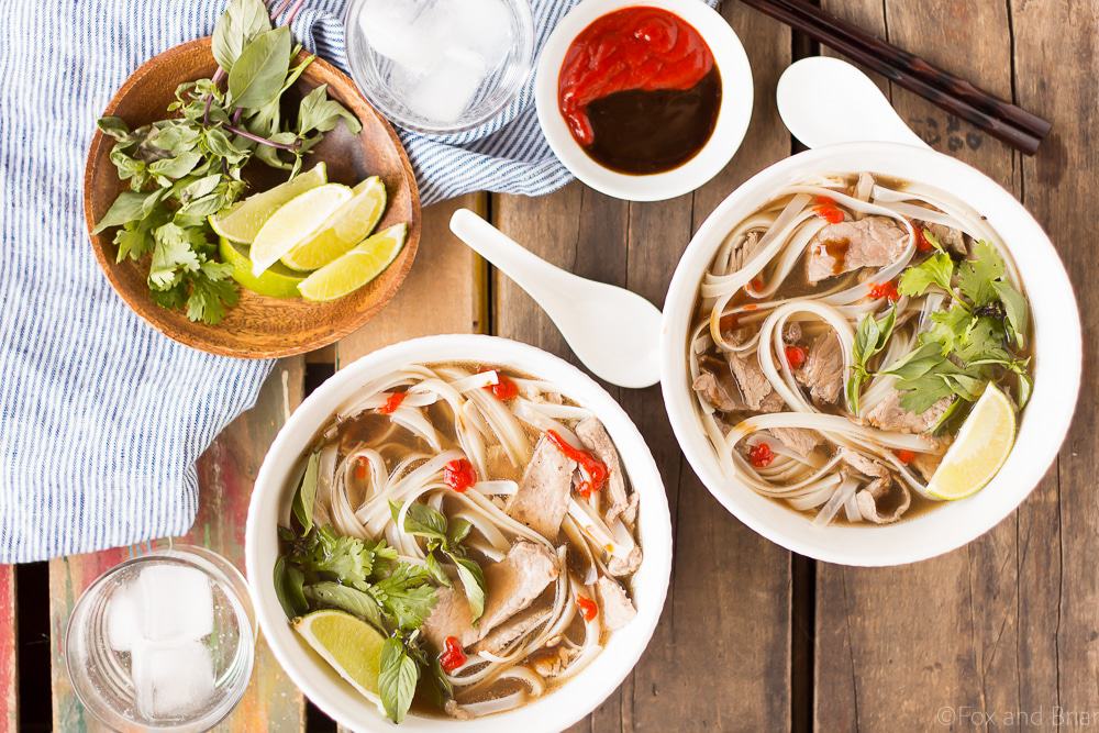 This easy Slow Cooker Beef Pho simmers away all day, creating a flavorful broth that you and your family can enjoy on a cold day! #sponsored