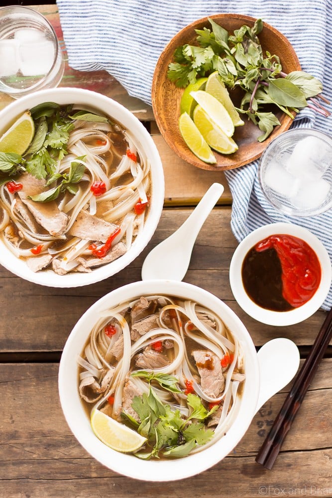 This easy Slow Cooker Beef Pho simmers away all day, creating a flavorful broth that you and your family can enjoy on a cold day! #sponsored