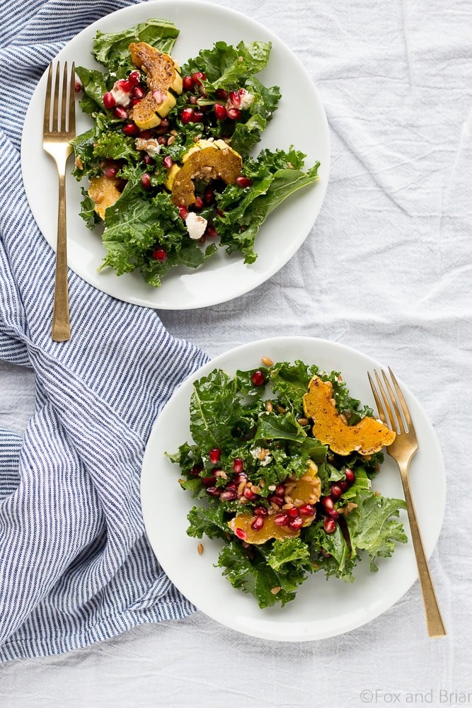 This Autumn Harvest Salad uses the beautiful produce available as the months start to get colder, such as delicata squash, kale, and pomegranates, as well as farro and goat cheese to make a hearty cold weather salad. Then it is all tossed together with a maple apple cider vinaigrette! #ad