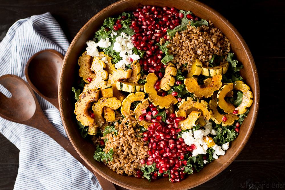 This Autumn Harvest Salad uses the beautiful produce available as the months start to get colder, such as delicata squash, kale, and pomegranates, as well as farro and goat cheese to make a hearty cold weather salad. Then it is all tossed together with a maple apple cider vinaigrette! #ad