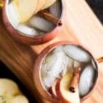 This Apple Cider Irish Mule is a fall twist on the classic! Apple Cider, ginger beer and whiskey make an Autumn cocktail to cozy up with on a cold day!