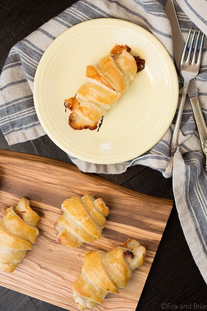 These Easy Ham and Cheese Croissants only use four ingredients and can be made in about 20 minutes! Using ham, Gruyère and puff pastry, they are delicious for breakfast, lunch or dinner. Great for using up leftover ham from the holidays!