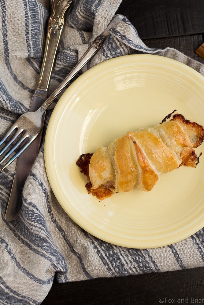 These Easy Ham and Cheese Croissants only use four ingredients and can be made in about 20 minutes! Using ham, Gruyère and puff pastry, they are delicious for breakfast, lunch or dinner. Great for using up leftover ham from the holidays!