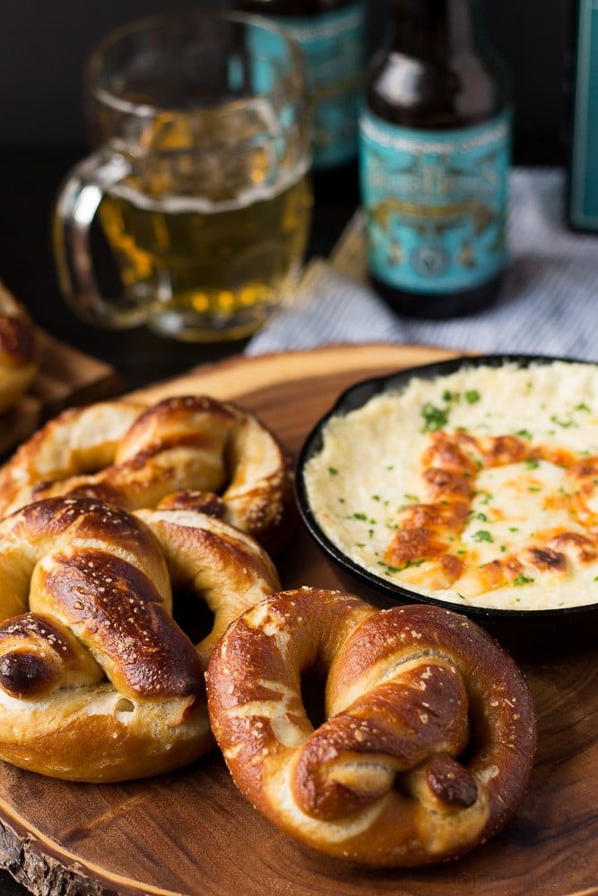 These Soft Beer Pretzels with Beer Cheese Dip are soft and fluffy pretzels with a cheesy dip. Perfect for game day, parties, or any time you need a snack to go with your beer. #ad