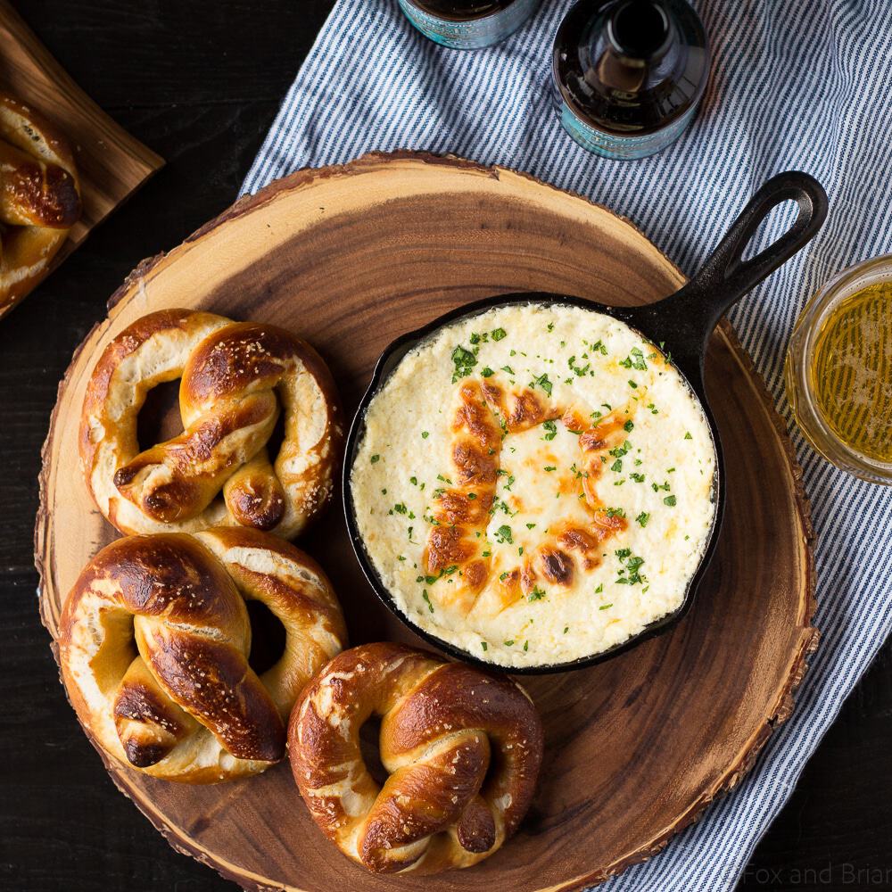 These Soft Beer Pretzels with Beer Cheese Dip are soft and fluffy pretzels with a cheesy dip. Perfect for game day, parties, or any time you need a snack to go with your beer. #ad