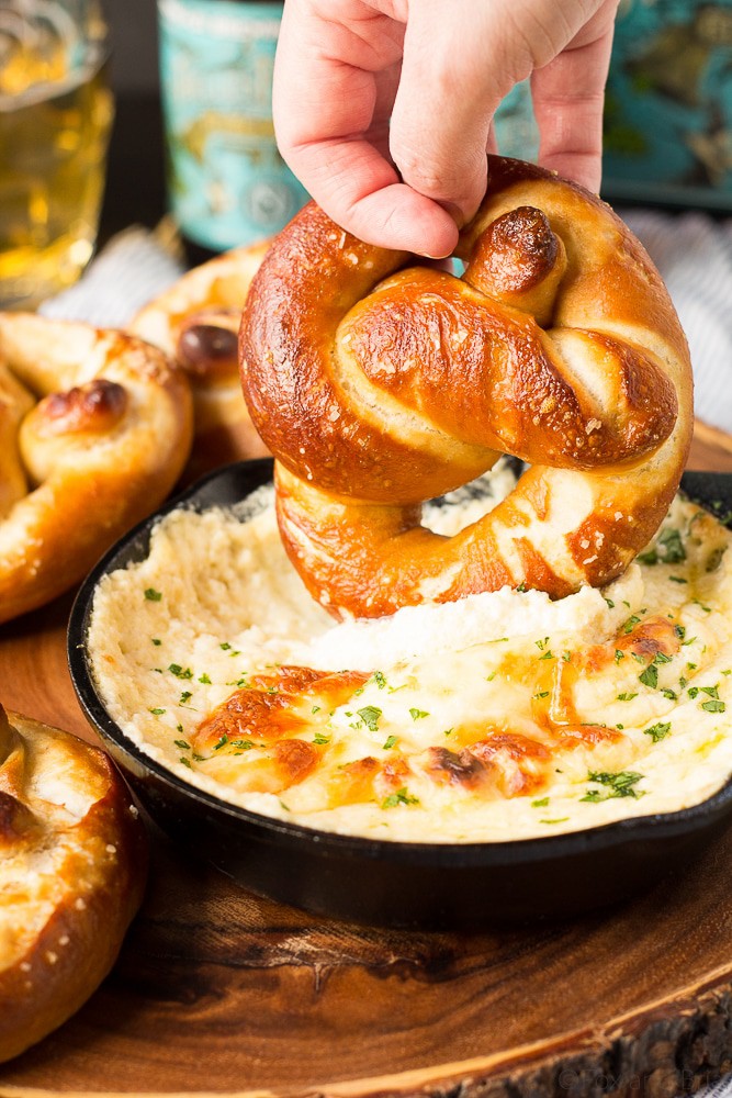 These Soft Beer Pretzels with Beer Cheese Dip are soft and fluffy pretzels with a cheesy dip. Perfect for game day, parties, or any time you need a snack to go with your beer. #ad