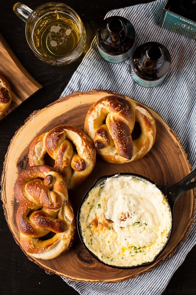 These Soft Beer Pretzels with Beer Cheese Dip are soft and fluffy pretzels with a cheesy dip. Perfect for game day, parties, or any time you need a snack to go with your beer. #ad