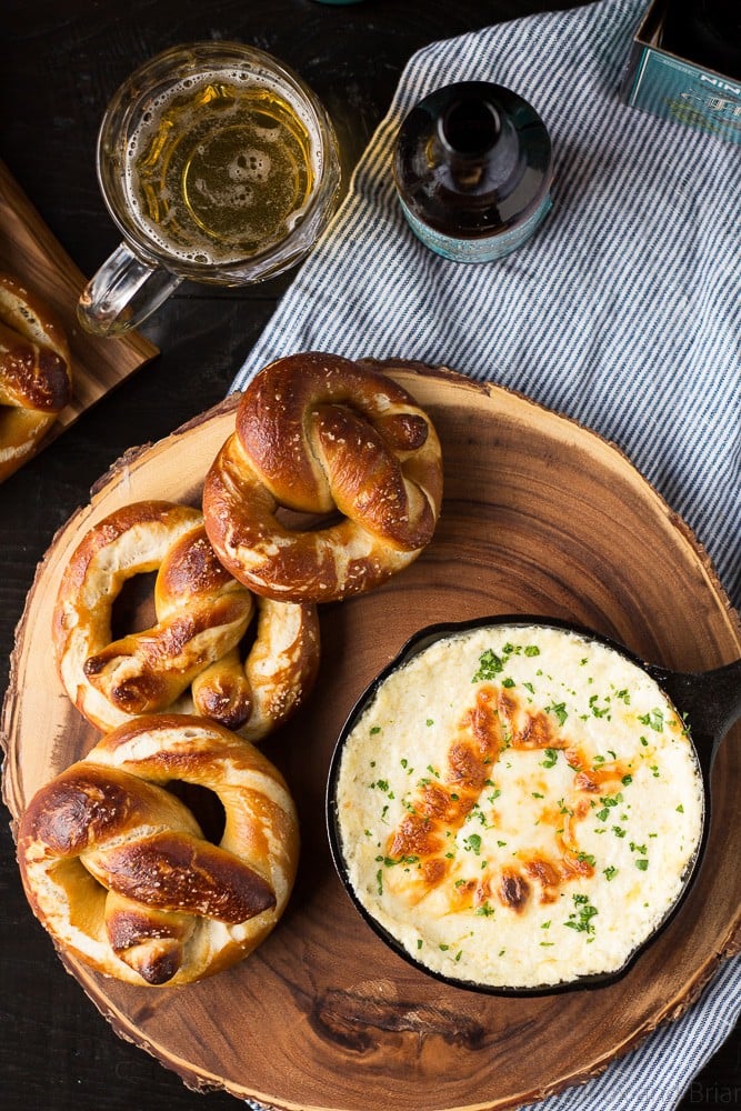 These Soft Beer Pretzels with Beer Cheese Dip are soft and fluffy pretzels with a cheesy dip. Perfect for game day, parties, or any time you need a snack to go with your beer. #ad