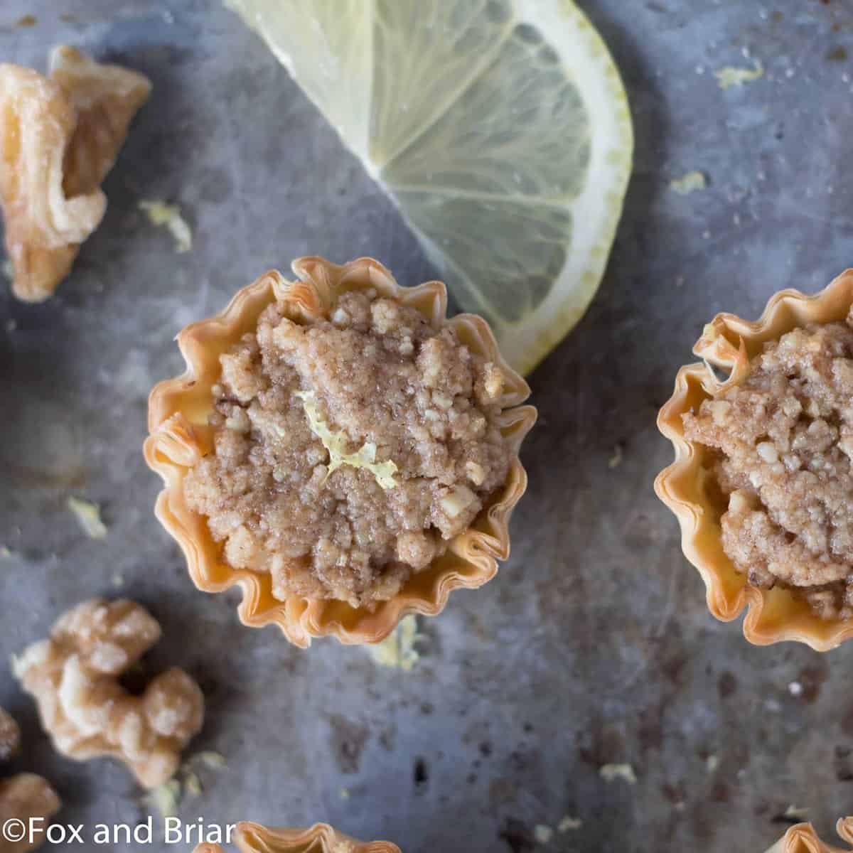 These Mini Baklava Cups are a cute, bite sized dessert with all the flavors of baklava - but without all the work! Only a few ingredients and 20 minutes will give you these perfect mini desserts!