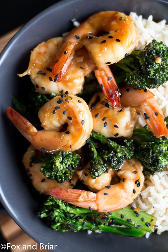 This Honey Sesame Shrimp and Broccoli is a quick and easy dinner. Shrimp and broccoli are quickly sauteed in a sweet and savory sauce that everyone will love! This is great served over rice or noodles, or you can use cauliflower rice or zoodles for a lower carb dinner.