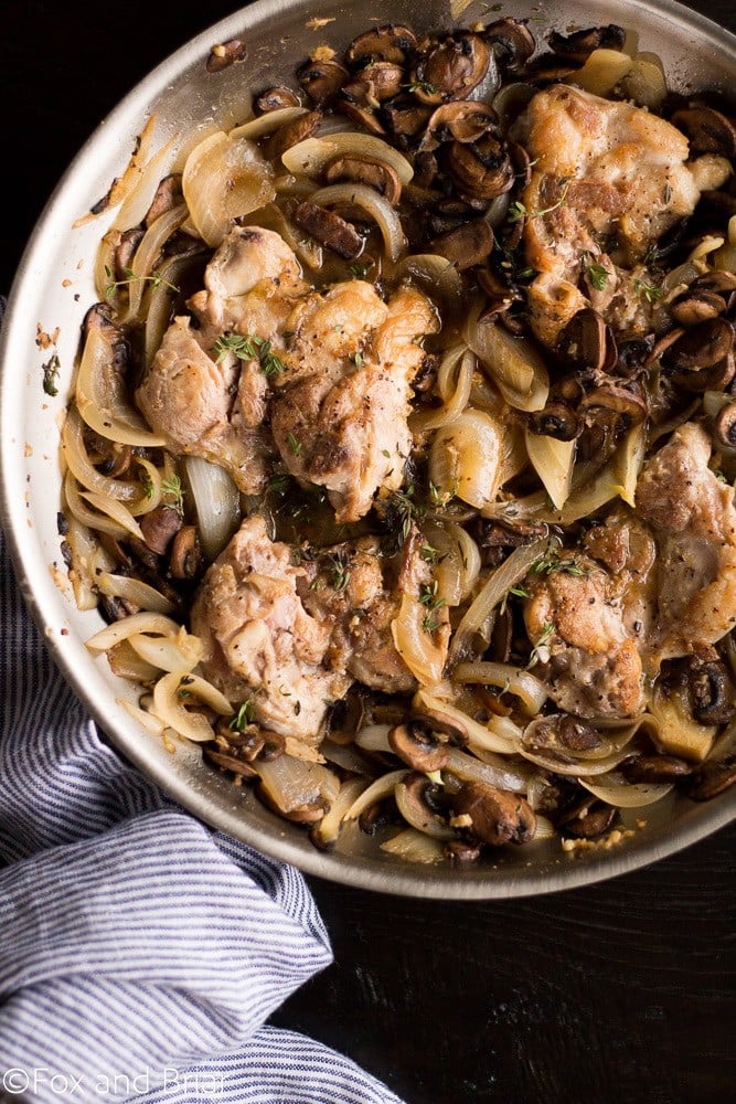 Skillet Chicken and White wine Mushrooms is a fast and easy dinner recipe. Juicy Chicken thighs with a white wine mushroom sauce that has no cream!