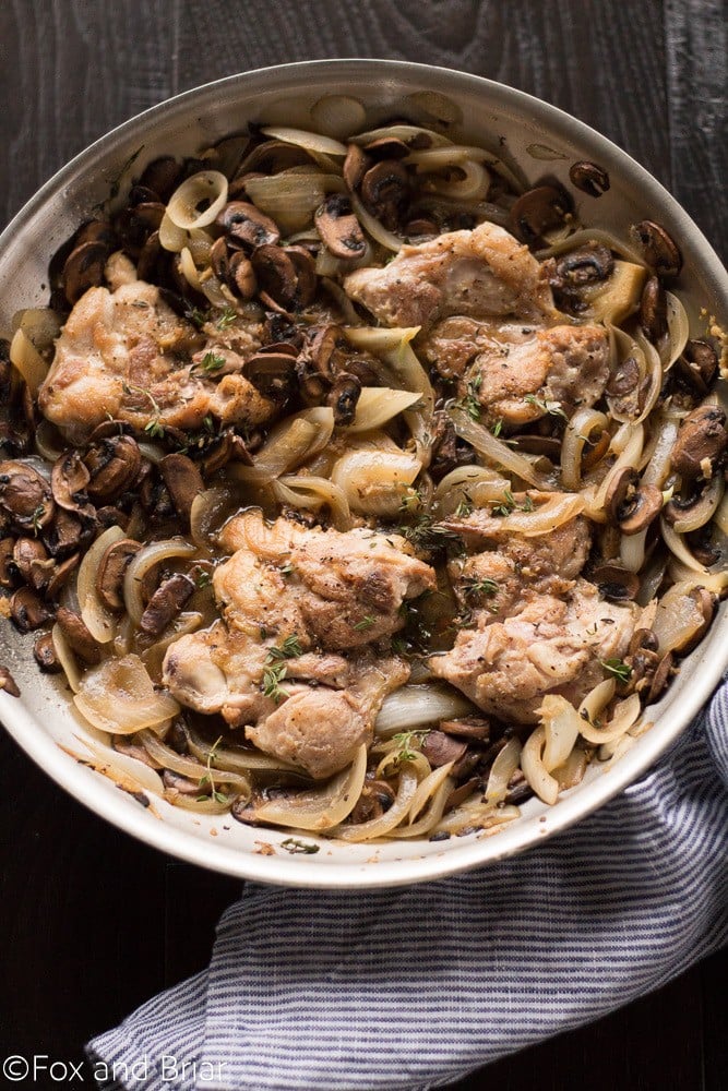 Skillet Chicken and White wine Mushrooms is a fast and easy dinner recipe. Juicy Chicken thighs with a white wine mushroom sauce that has no cream!