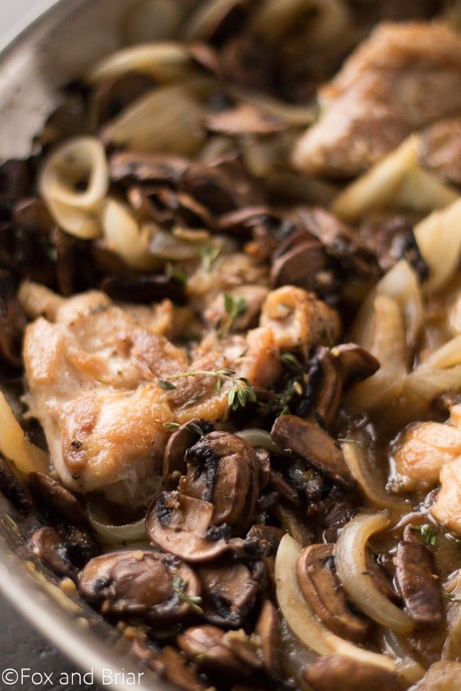 Skillet Chicken and White wine Mushrooms is a fast and easy dinner recipe. Juicy Chicken thighs with a white wine mushroom sauce that has no cream!