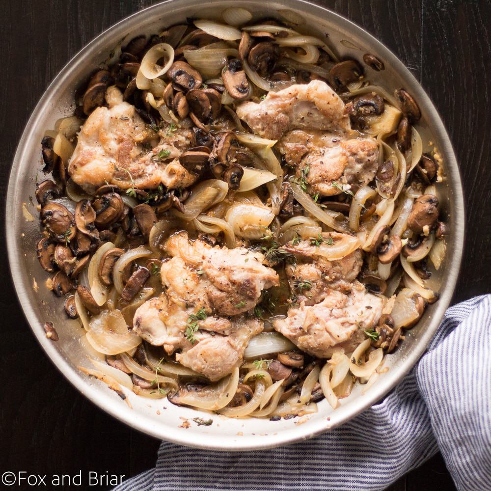 Skillet Chicken and White wine Mushrooms is a fast and easy dinner recipe. Juicy Chicken thighs with a white wine mushroom sauce that has no cream!