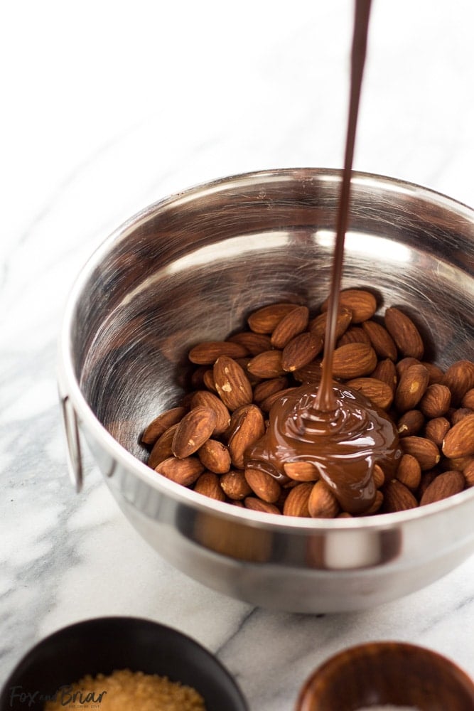 Dark Chocolate Almonds with Sea Salt and Turbinado Sugar just like Trader Joe's, but you can make them at home! Only four ingredients and a few minutes is all it takes to make these healthy and delicious treats.