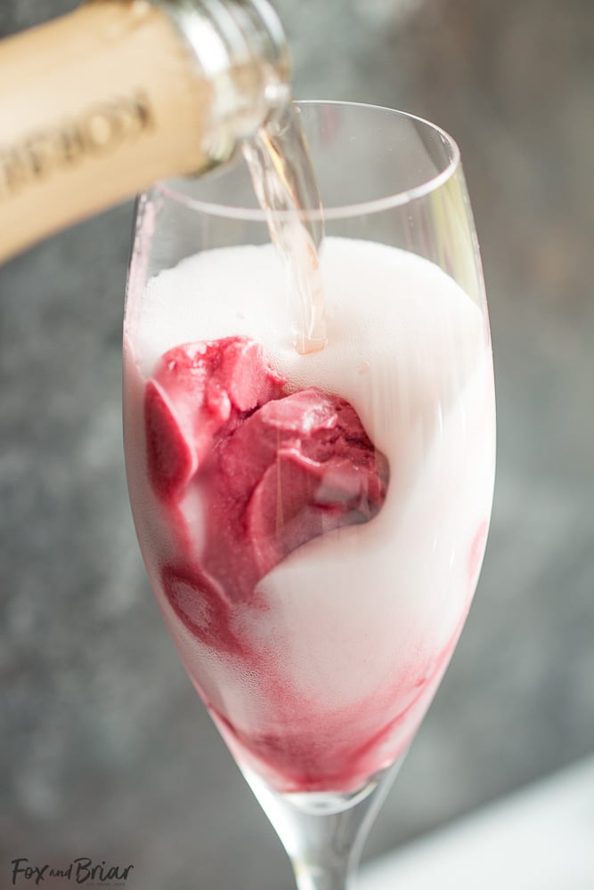 Rosé Raspberry Sorbet Mimosas are a fun cocktail for Mother's Day, bridal showers, brunch or just a girls get together. These girly cocktails are so easy to make and everyone will love them! | Bridal Shower drinks | Mother's Day drinks | Brunch cocktails | easy mimosa | sorbet mimosa | pink drink