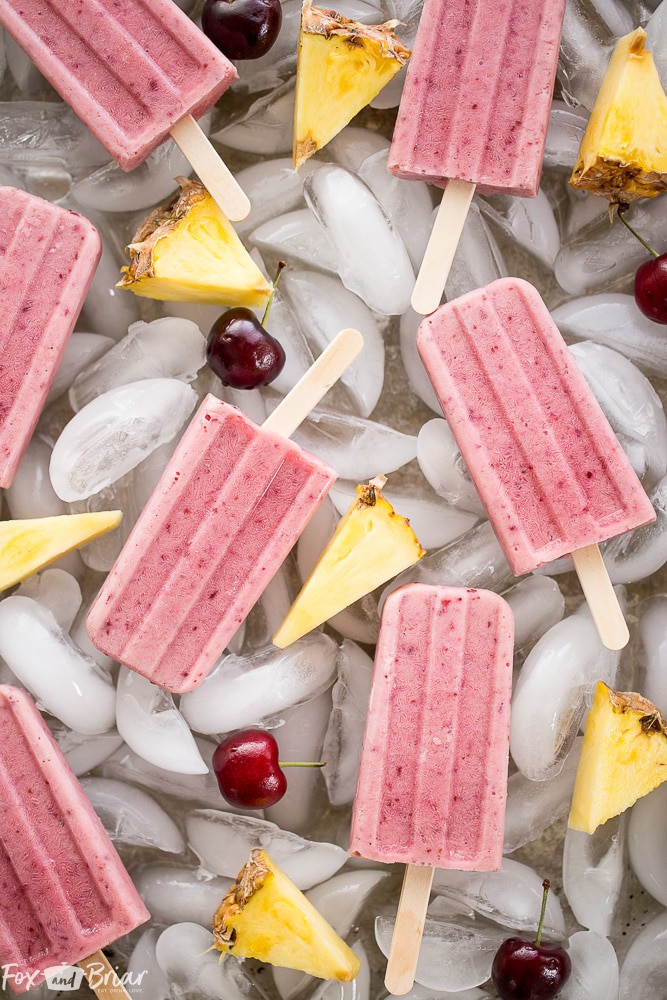 These Post Workout Smoothie Popsicles will keep you cool and refuel your body after a tough workout! Perfect for hot summer days, these healthy popsicles have no added sugar and and are a grab and go snack on busy days. | No added sugar popsicles | healthy popsicles | Healthy snack | Sugar Free Snack | 