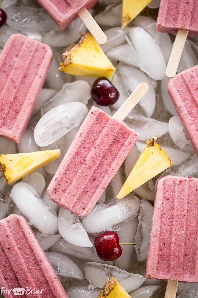 These Post Workout Smoothie Popsicles will keep you cool and refuel your body after a tough workout! Perfect for hot summer days, these healthy popsicles have no added sugar and and are a grab and go snack on busy days. | No added sugar popsicles | healthy popsicles | Healthy snack | Sugar Free Snack | 