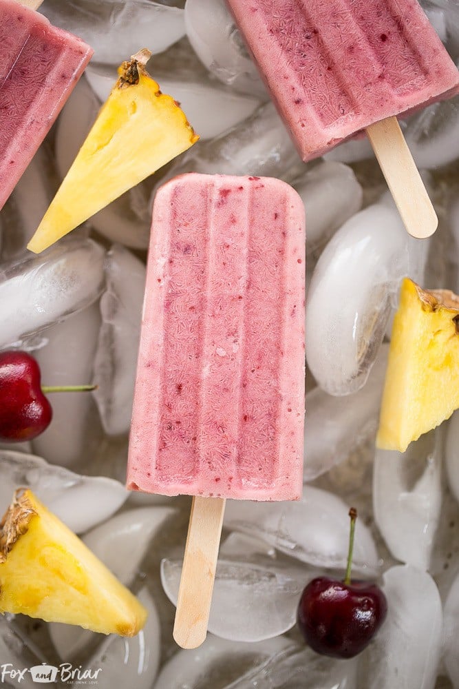 These Post Workout Smoothie Popsicles will keep you cool and refuel your body after a tough workout! Perfect for hot summer days, these healthy popsicles have no added sugar and and are a grab and go snack on busy days. | No added sugar popsicles | healthy popsicles | Healthy snack | Sugar Free Snack | 