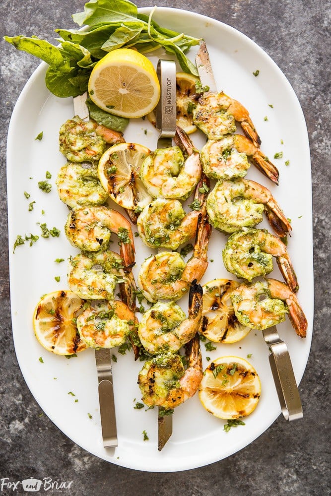 These Easy Pesto Grilled Shrimp make a quick appetizer or dinner perfect for any summer evening. Grilling recipes | Easy grilling recipe | Low Carb Grilled recipes | Quick dinner | Healthy Dinner | Shrimp Recipes