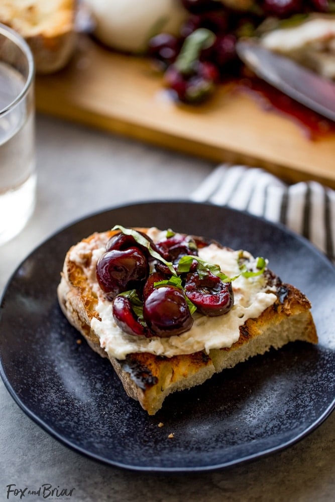 This Burrata with Balsamic Cherries and Basil the ultimate summer appetizer! Creamy, fresh burrata paired with juicy cherries and fragrant basil uses summer produce at its best, and no cooking required! Summer appetizers | Cherry Recipes | basil Recipes | burrata Recipes | party appetizers