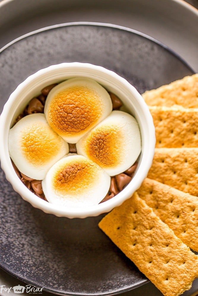 This One Minute S'mores Dip for One is perfect for a late night sweet tooth. Desserts for One | Microwave Desserts | Quick and Easy Desserts | Microwave S'mores | Quick Treats | Chocolate and Marshmallow Dessert