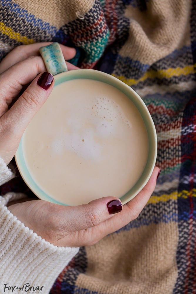 How to make Chai tea from scratch | Chai tea latte recipe | Chai mix Recipes | Chai recipe | Easy Chai tea recipe | Chai Concentrate | Hands wrapped around mug of chai | 