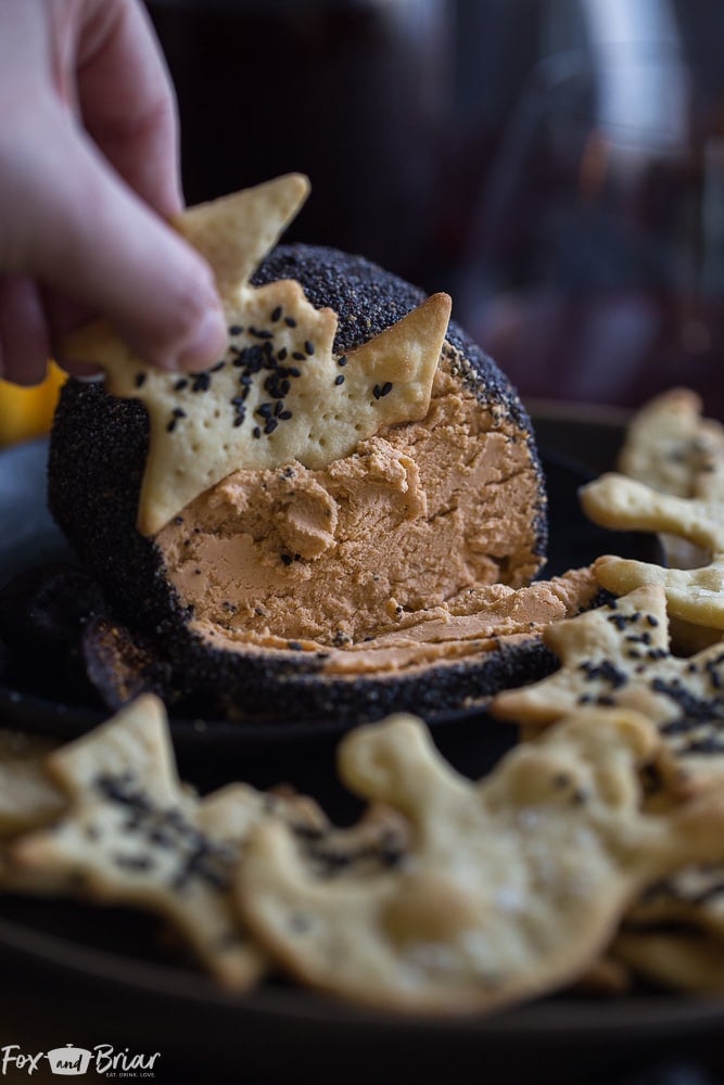 This spooky Roasted Garlic Cheese Ball is perfect for your Halloween party! Cheese Ball Recipe | Halloween Party foods | Grown Up Halloween | Adult Halloween | Classy Halloween