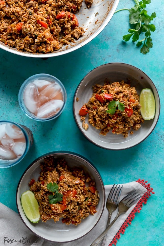 This Healthy Cauliflower Rice Turkey Taco Skillet is a quick and healthy low carb dinner. An easy way to sneak in extra veggies but packed with flavor! | Mexican cauliflower rice recipe | Healthy dinner recipe | Low carb cauliflower rice recipe | Easy cauliflower rice dinner recipe | Quick dinner recipe | Quick and healthy dinner ideas | One pot | paleo | whole 30 | ground turkey recipe | low calorie dinner recipe