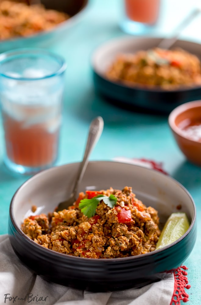 This Healthy Cauliflower Rice Turkey Taco Skillet is a quick and healthy low carb dinner. An easy way to sneak in extra veggies but packed with flavor! | Mexican cauliflower rice recipe | Healthy dinner recipe | Low carb cauliflower rice recipe | Easy cauliflower rice dinner recipe | Quick dinner recipe | Quick and healthy dinner ideas | One pot | paleo | whole 30 | ground turkey recipe | low calorie dinner recipe