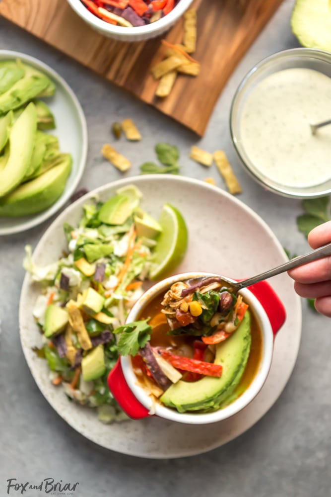 Veggie Packed, Healthy Slow Cooker Chicken Tortilla Soup and Southwest Salad | Crock Pot Chicken Tortilla Soup | Easy Chicken Tortilla Soup | Veggie Packed Meals | Easy Weeknight Dinner | Easy Meal to serve a crowd | Low Carb Chicken Tortilla Soup | Black Beans | Avocados | Lime Juice | Corn | Chicken Tortilla Soup Recipe #ad #GotoGreens #TaylorFarms
