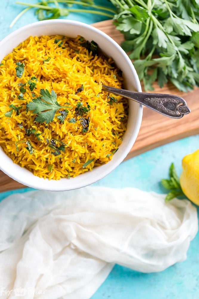 This vibrant Turmeric Rice Recipe is a fast and easy side dish perfect for brightening up your weeknight dinner. Easy Turmeric Rice Recipe | Simple Turmeric Rice | Middle Eastern Recipes | Indian Recipes | Mediterranean Recipes | Side Dishes | Basmati Rice | Jasmine Rice | Rice Dish