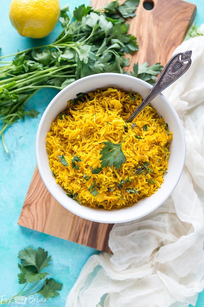 This vibrant Turmeric Rice Recipe is a fast and easy side dish perfect for brightening up your weeknight dinner. Easy Turmeric Rice Recipe | Simple Turmeric Rice | Middle Eastern Recipes | Indian Recipes | Mediterranean Recipes | Side Dishes | Basmati Rice | Jasmine Rice | Rice Dish
