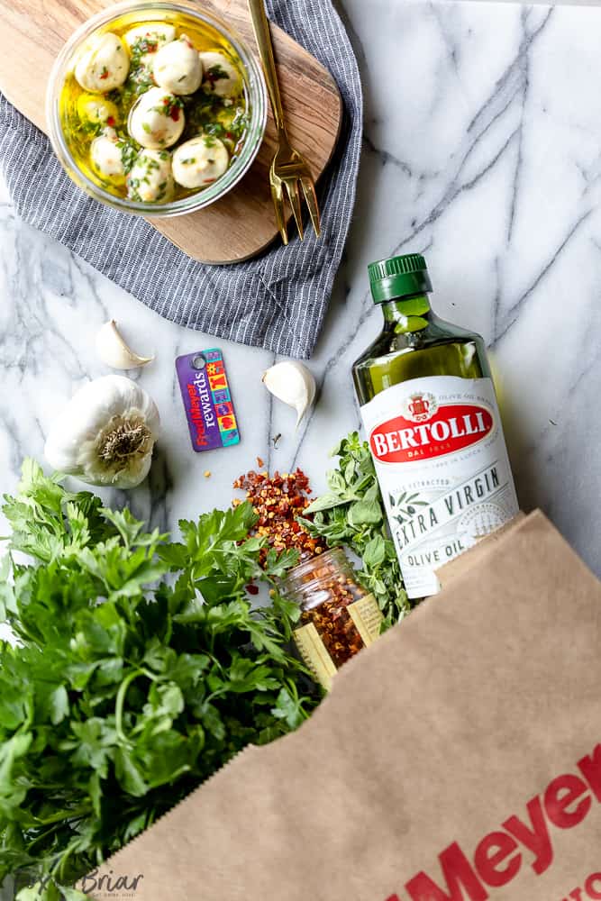 These Olive Oil Marinated Mozzarella Balls are a quick and easy appetizer that takes less than 15 minutes to make. @bertolli #ad #TheRecipeIsSimple | Make Ahead | For a party | Quick | For a crowd | cold appetizer | no cook | bites | finger food | snacks | Low carb appetizers